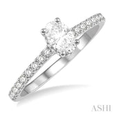 1/2 ctw Round Cut Diamond Engagement Ring With 1/4 ct Oval Cut Center Stone in 14K White Gold